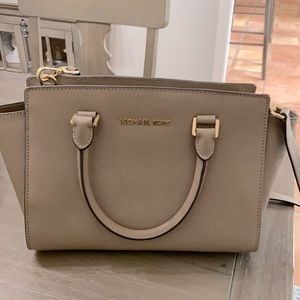 Michael Kors purse with optional shoulder strap.